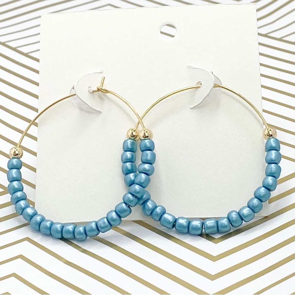 Gold earrings blue beaded hoops